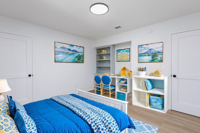 bedroom featuring light hardwood / wood-style floors