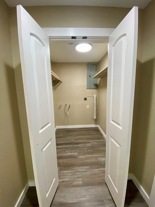 122 Otteson Ln, Lufkin, TX 75901 - washroom featuring wood finished floors, electric panel, and electric dryer hookup
