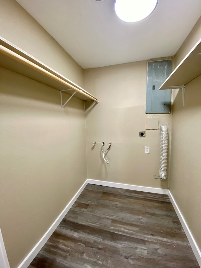 122 Otteson Ln, Lufkin, TX 75901 - laundry room with electric dryer hookup, electric panel, and dark wood-style flooring