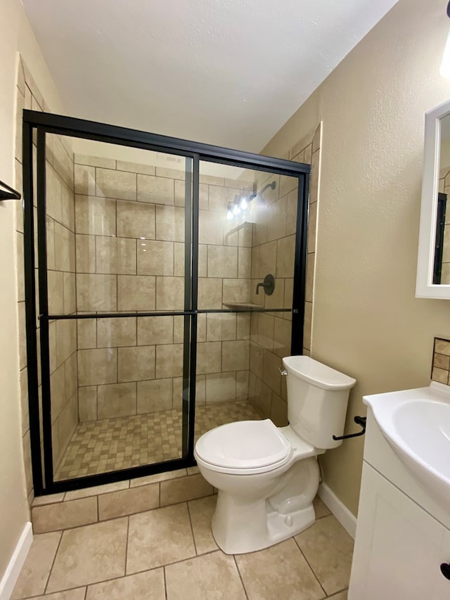 122 Otteson Ln, Lufkin, TX 75901 - full bath featuring vanity, a shower stall, and tile patterned flooring