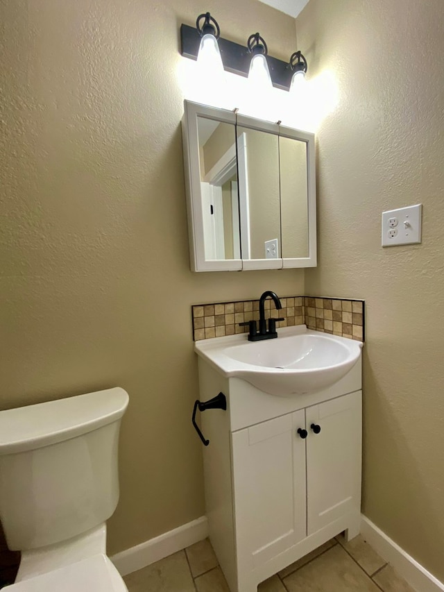 122 Otteson Ln, Lufkin, TX 75901 - bathroom with tile patterned flooring, vanity, and tasteful backsplash