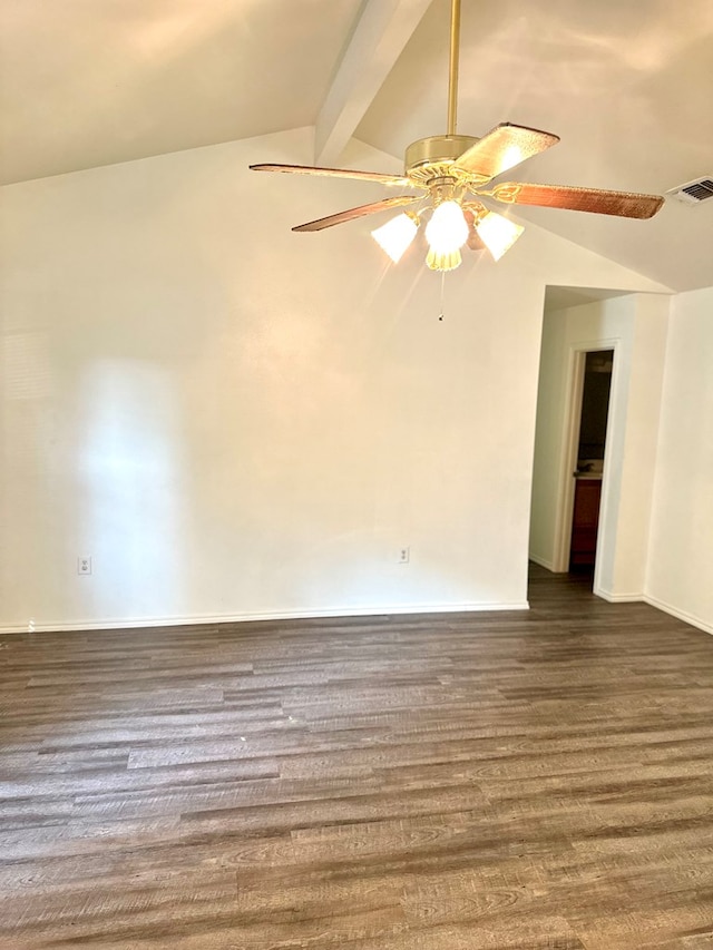 unfurnished room with dark hardwood / wood-style flooring and lofted ceiling with beams