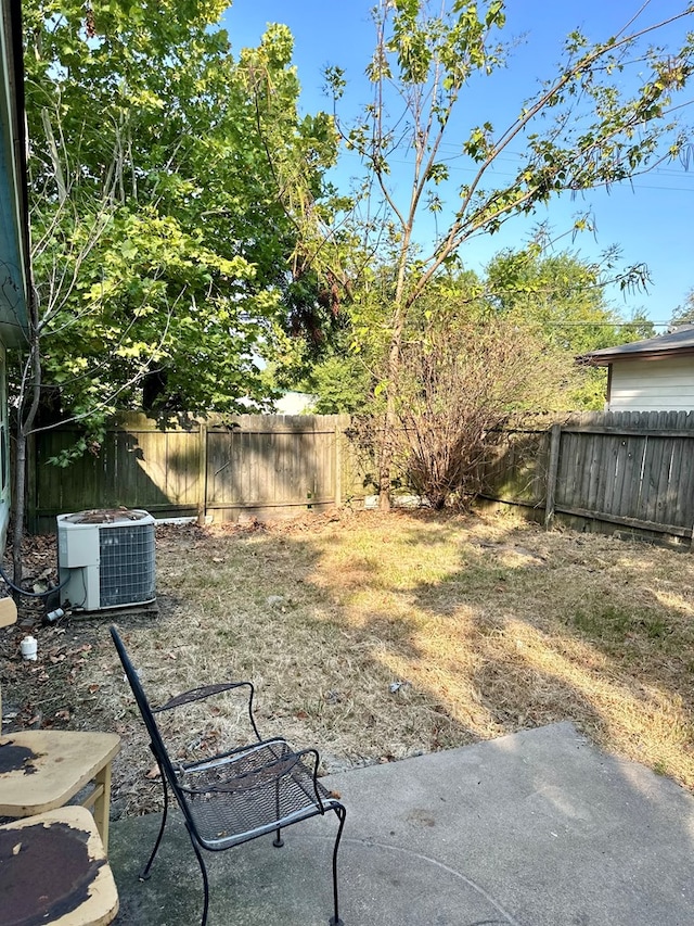 view of yard featuring central AC