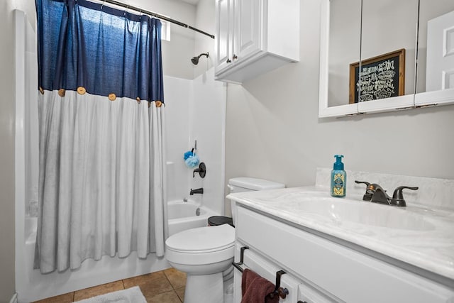 bathroom with shower / bath combo with shower curtain, toilet, vanity, and tile patterned flooring