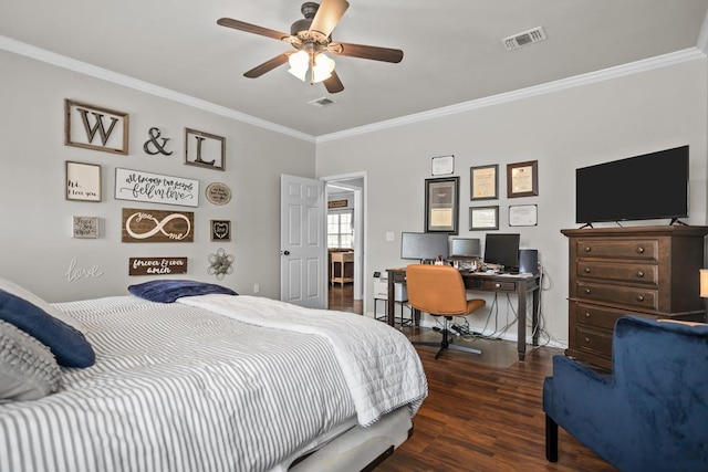 bedroom featuring visible vents, ornamental molding, and wood finished floors