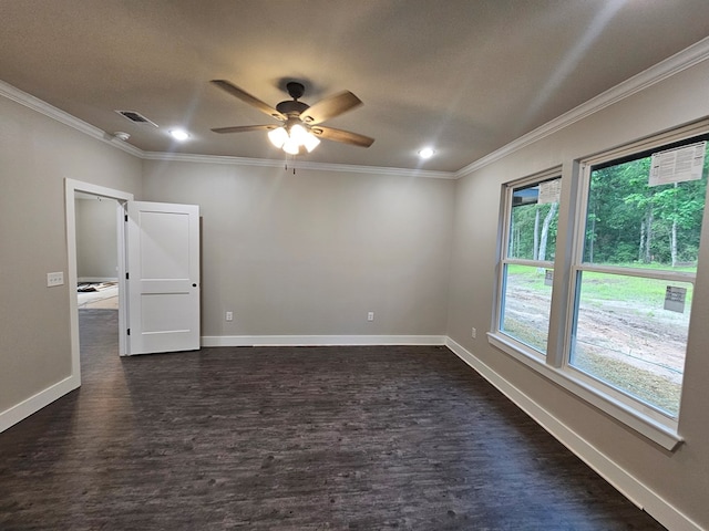317 Shirey Ln, Lufkin, TX 75901 - unfurnished room with dark wood finished floors, baseboards, visible vents, a ceiling fan, and ornamental molding