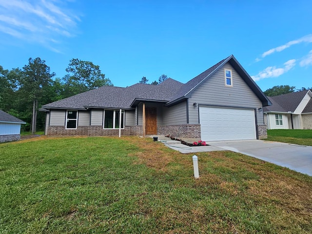 317 Shirey Ln, Lufkin, TX 75901 - ranch-style house featuring roof with shingles, a front lawn, concrete driveway, brick siding, and an attached garage