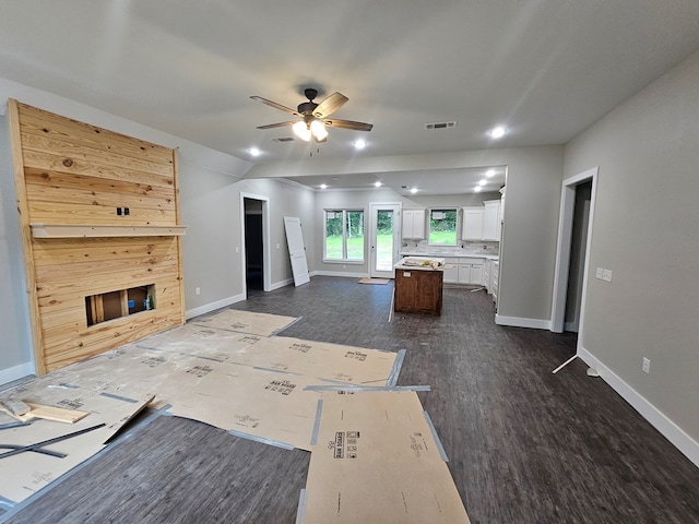 317 Shirey Ln, Lufkin, TX 75901 - unfurnished living room featuring recessed lighting, a ceiling fan, baseboards, and dark wood-style floors