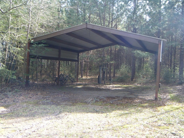 exterior space featuring a carport