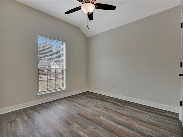 unfurnished room featuring lofted ceiling, dark hardwood / wood-style floors, and ceiling fan