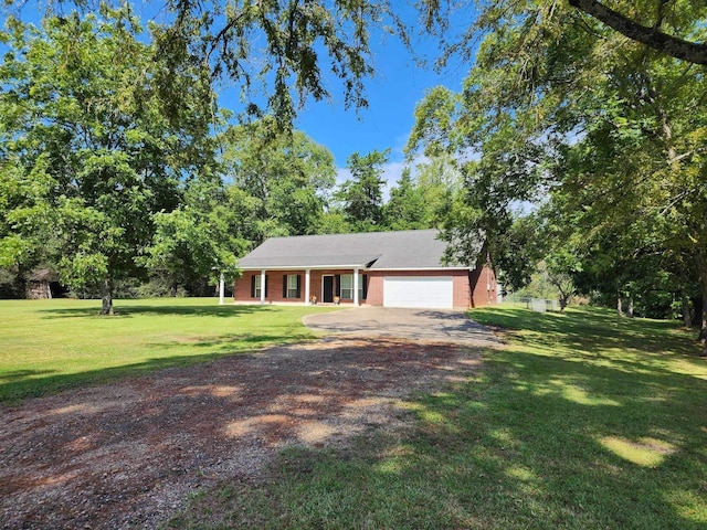 ranch-style house with a front yard and a garage