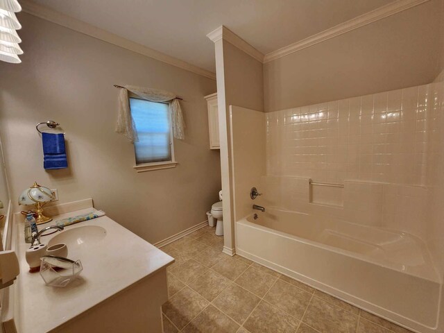 full bathroom with tile patterned floors, shower / bathing tub combination, crown molding, toilet, and vanity