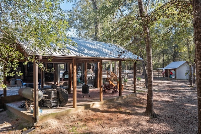 exterior space with a shed