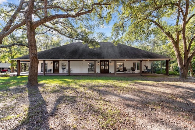 single story home featuring french doors