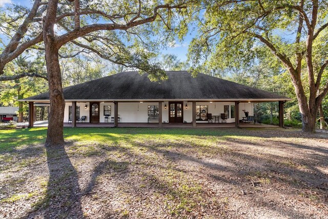 single story home featuring french doors