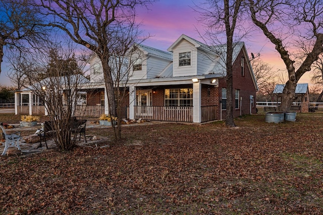 view of front of house featuring covered porch