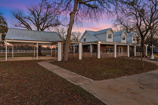 view of front facade featuring a gazebo and a porch