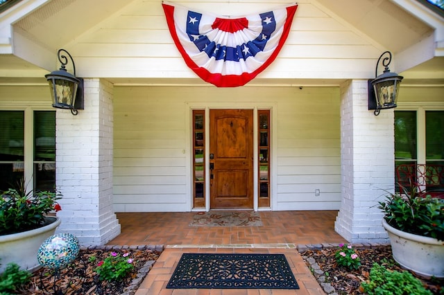 1514 Spanish Moss Dr, Lufkin, TX 75904 - entrance to property with a porch and brick siding