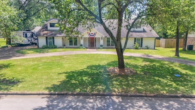 1514 Spanish Moss Dr, Lufkin, TX 75904 - view of front of house with curved driveway and cooling unit