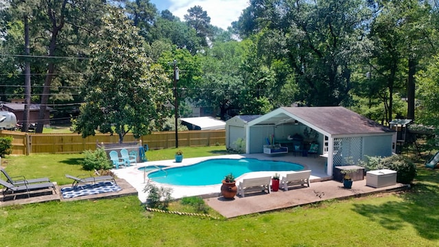 1514 Spanish Moss Dr, Lufkin, TX 75904 - view of swimming pool featuring a patio and an outdoor structure