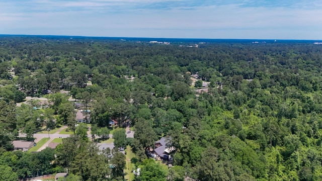 1514 Spanish Moss Dr, Lufkin, TX 75904 - aerial view of property and surrounding area featuring a heavily wooded area