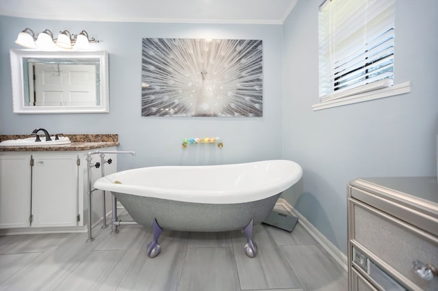 1514 Spanish Moss Dr, Lufkin, TX 75904 - full bathroom featuring baseboards, a freestanding bath, and vanity