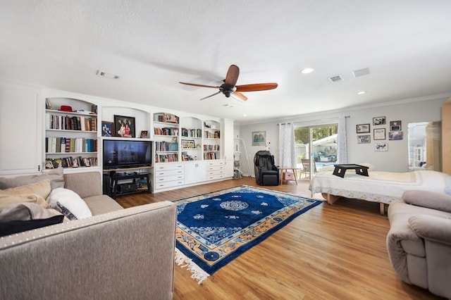 1514 Spanish Moss Dr, Lufkin, TX 75904 - living room featuring a ceiling fan, wood finished floors, crown molding, and recessed lighting