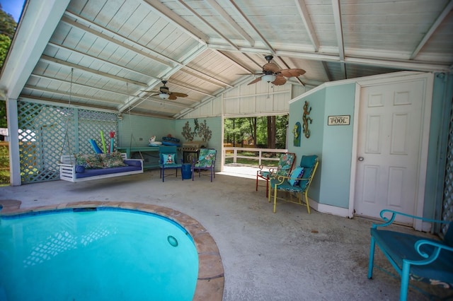 1514 Spanish Moss Dr, Lufkin, TX 75904 - swimming pool featuring a ceiling fan and a patio