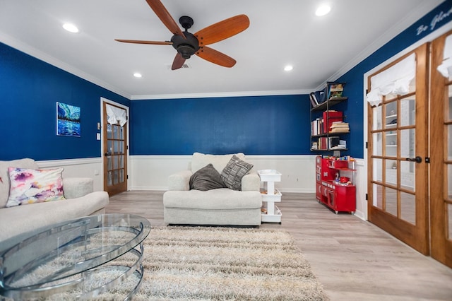 1514 Spanish Moss Dr, Lufkin, TX 75904 - living room featuring french doors, ornamental molding, wainscoting, ceiling fan, and wood finished floors