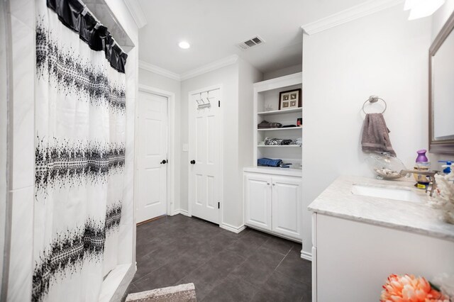 1514 Spanish Moss Dr, Lufkin, TX 75904 - full bathroom with crown molding, vanity, recessed lighting, baseboards, and tile patterned flooring