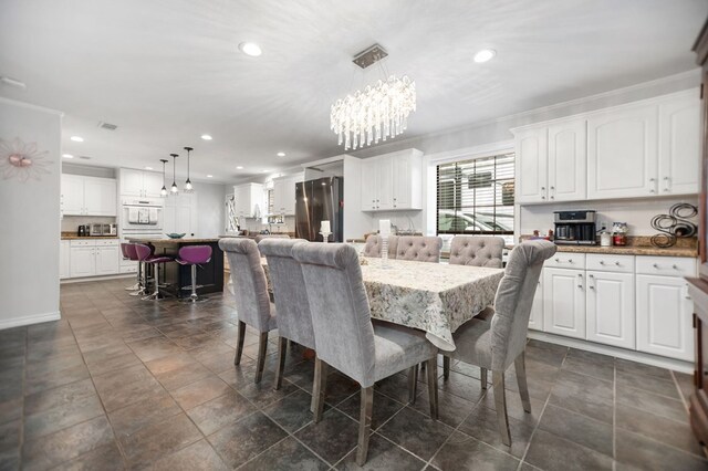 1514 Spanish Moss Dr, Lufkin, TX 75904 - dining room featuring a chandelier, recessed lighting, and baseboards
