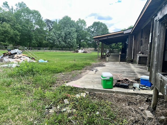 view of yard with a patio and fence