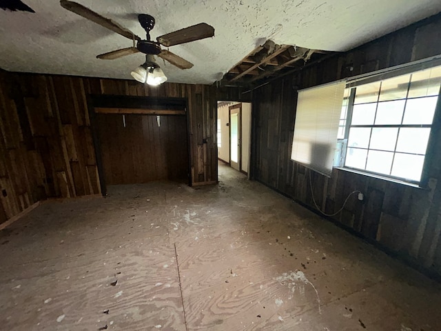 spare room featuring ceiling fan