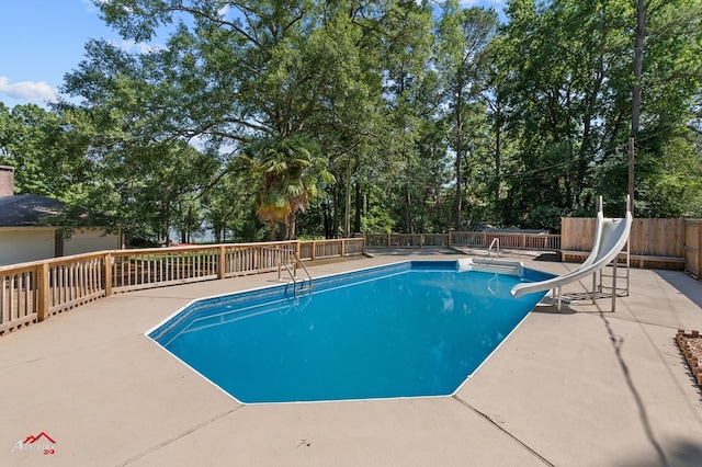 806 Cartwright, San Augustine, TX 75972 - view of pool featuring a water slide and a patio