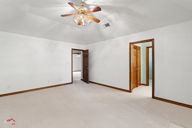 806 Cartwright, San Augustine, TX 75972 - unfurnished room featuring light carpet, a ceiling fan, baseboards, and high vaulted ceiling