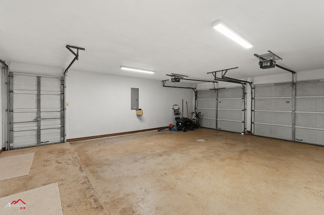 806 Cartwright, San Augustine, TX 75972 - garage featuring electric panel and a garage door opener