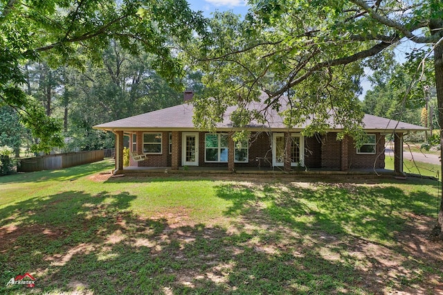 806 Cartwright, San Augustine, TX 75972 - ranch-style home featuring brick siding and a chimney