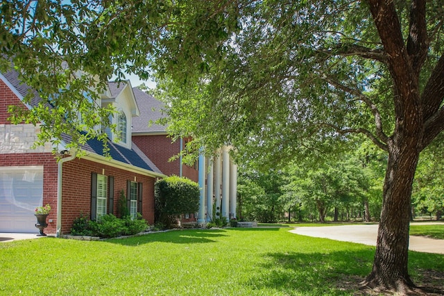 486 Brookwood Dr, Diboll, TX 75941 - view of yard featuring a garage