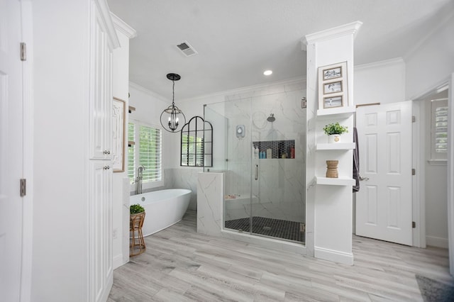 486 Brookwood Dr, Diboll, TX 75941 - bathroom with crown molding, a marble finish shower, a freestanding bath, and visible vents