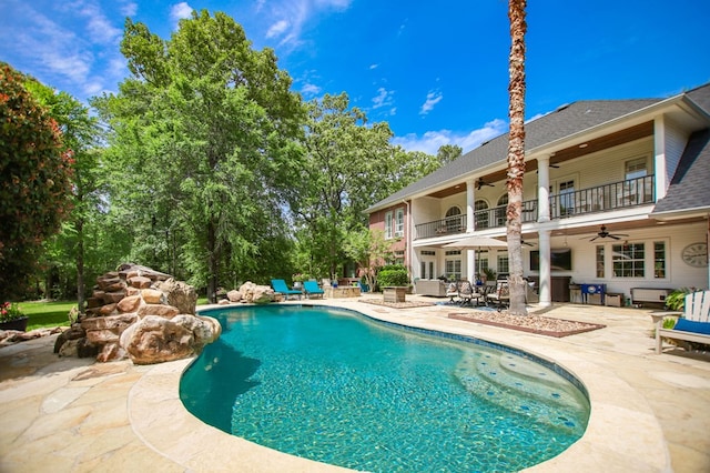 486 Brookwood Dr, Diboll, TX 75941 - outdoor pool with a patio and ceiling fan