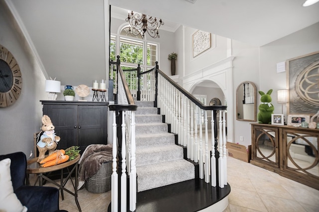 486 Brookwood Dr, Diboll, TX 75941 - staircase with a chandelier, ornamental molding, and tile patterned flooring