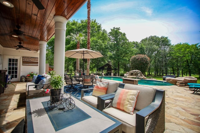 486 Brookwood Dr, Diboll, TX 75941 - view of patio / terrace with an outdoor hangout area, outdoor dining area, ceiling fan, and an outdoor pool