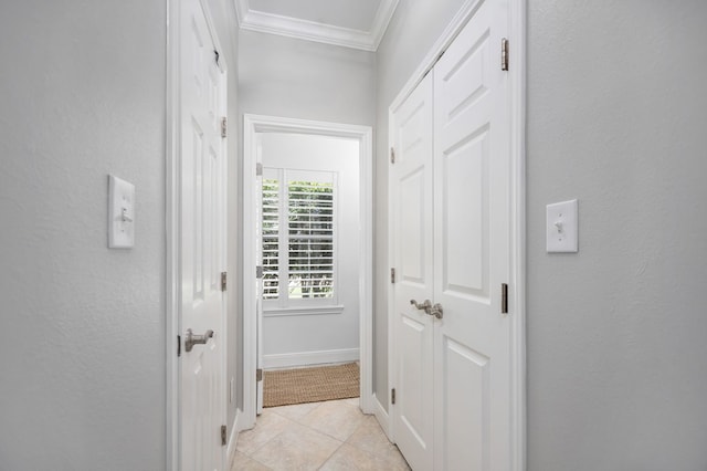 486 Brookwood Dr, Diboll, TX 75941 - hallway featuring crown molding, baseboards, and light tile patterned flooring