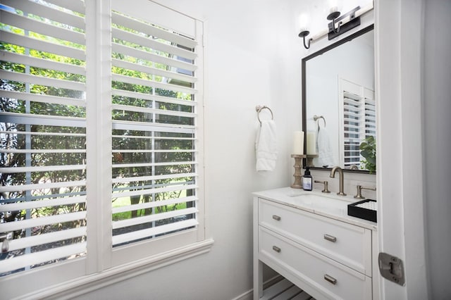 486 Brookwood Dr, Diboll, TX 75941 - bathroom featuring a healthy amount of sunlight and vanity