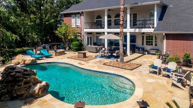 486 Brookwood Dr, Diboll, TX 75941 - outdoor pool with a patio, ceiling fan, and outdoor lounge area