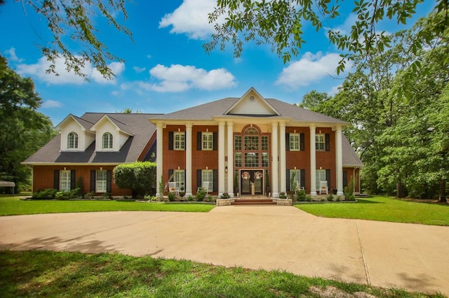 486 Brookwood Dr, Diboll, TX 75941 - greek revival inspired property with a front yard
