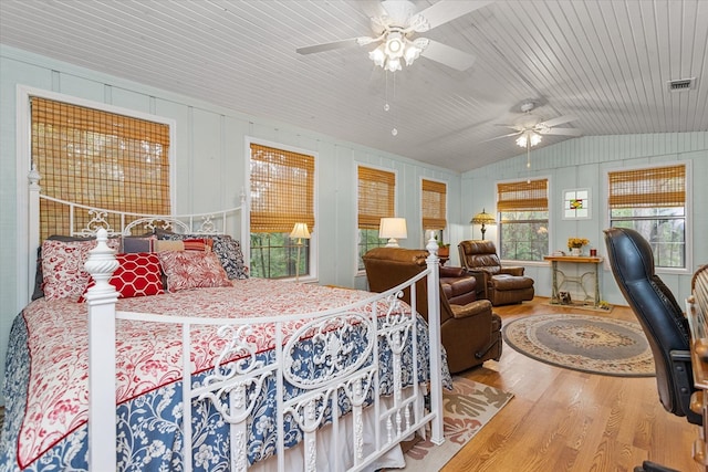 bedroom featuring wooden ceiling, hardwood / wood-style flooring, ceiling fan, and lofted ceiling