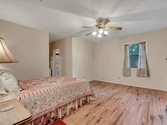 bedroom with ceiling fan and light hardwood / wood-style floors