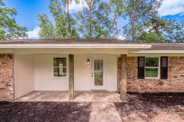 1311 Walnut Bend Dr, Lufkin, TX 75904 - property entrance featuring brick siding