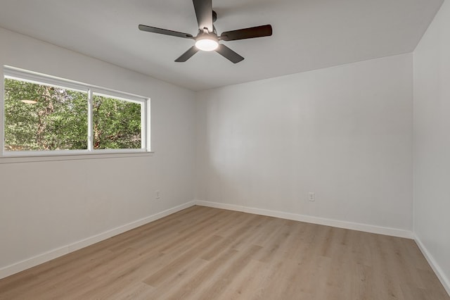 1311 Walnut Bend Dr, Lufkin, TX 75904 - unfurnished room featuring light wood-style floors and a ceiling fan